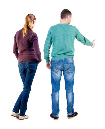 Back view of couple in sweater showing thumbs up. beautiful woman and man together. Rear view people collection. backside view of person. Isolated over white background.の写真素材