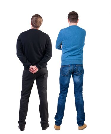 Back view of two man in sweater pointing. Rear view people collection. backside view of person. Isolated over white background.の写真素材