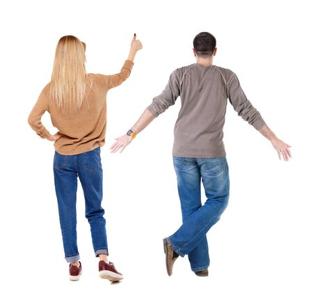 Back view of couple in sweater showing thumbs up. beautiful woman and man together. Rear view people collection. backside view of person. Isolated over white background.の写真素材