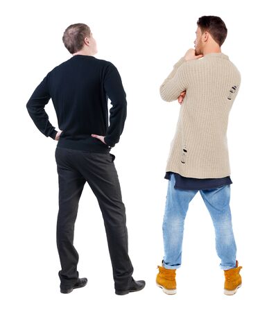 Back view of two man in sweater pointing. Rear view people collection. backside view of person. Isolated over white background.の写真素材