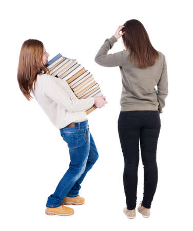 Back view of two woman in sweater. Rear view people collection. backside view of person. Isolated over white background.の写真素材