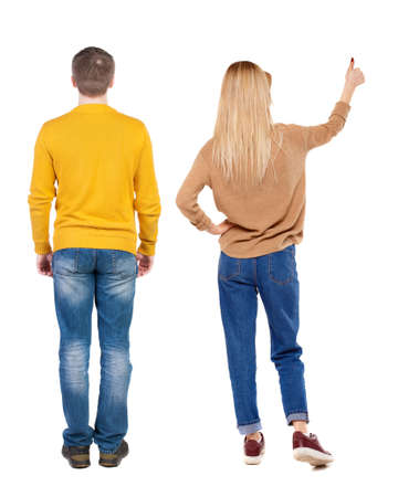 Back view of couple in sweater showing thumbs up. beautiful woman and man together. Rear view people collection. backside view of person. Isolated over white background.の写真素材