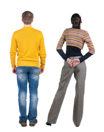 Back view couple in sweater. beautiful man and woman. Rear view people collection. backside view of person. Isolated over white background.の写真素材