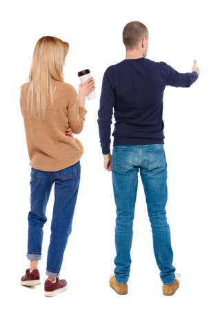 Back view of couple in sweater showing thumbs up. beautiful woman and man together. Rear view people collection. backside view of person. Isolated over white background.の写真素材