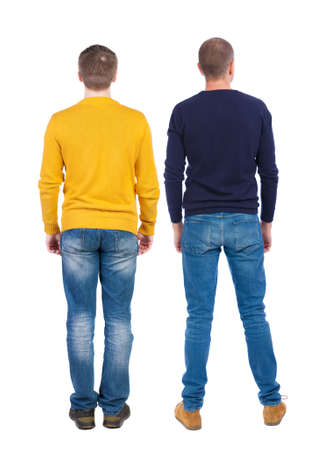 Back view of two man in sweater pointing. Rear view people collection. backside view of person. Isolated over white background.の写真素材