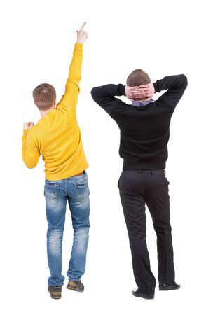 Back view of two man in sweater pointing. Rear view people collection. backside view of person. Isolated over white background.の写真素材