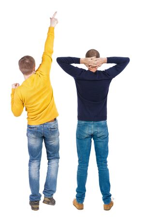 Back view of two man in sweater pointing. Rear view people collection. backside view of person. Isolated over white background.の写真素材
