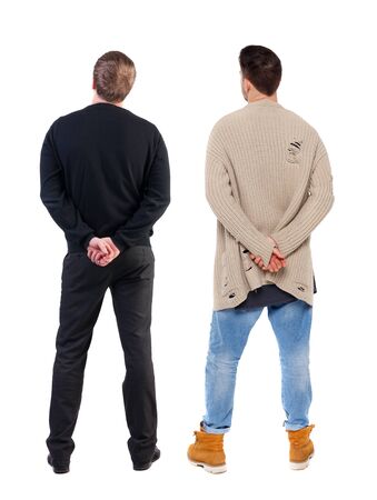 Back view of two man in sweater pointing. Rear view people collection. backside view of person. Isolated over white background.の写真素材