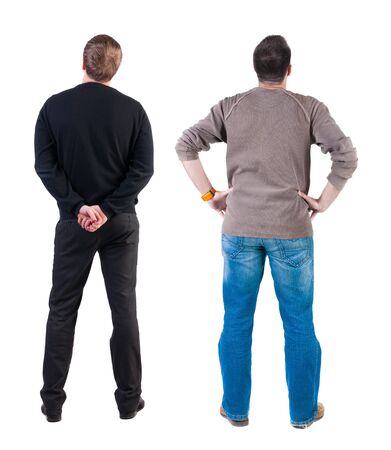 Back view of two man in sweater pointing. Rear view people collection. backside view of person. Isolated over white background.の写真素材