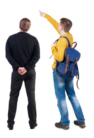 Back view of two man in sweater pointing. Rear view people collection. backside view of person. Isolated over white background.の写真素材