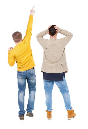 Back view of two man in sweater pointing. Rear view people collection. backside view of person. Isolated over white background.の写真素材