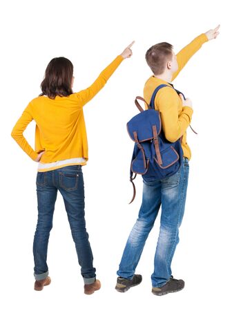 Back view of couple in sweater with mobile phone. beautiful friendly girl and guy together. Rear view people collection. backside view of person. Isolated over white background.の写真素材