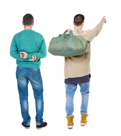 Back view of two man in sweater pointing. Rear view people collection. backside view of person. Isolated over white background.の写真素材