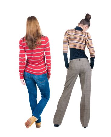 Back view of two woman in sweater. Rear view people collection. backside view of person. Isolated over white background.の写真素材