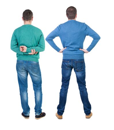 Back view of two man in sweater pointing. Rear view people collection. backside view of person. Isolated over white background.の写真素材