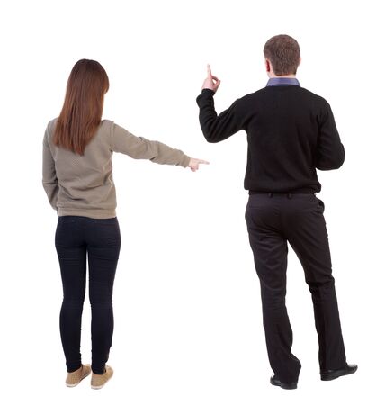 Back view of couple in sweater with mobile phone. beautiful friendly girl and guy together. Rear view people collection. backside view of person. Isolated over white background.の写真素材