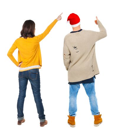 Back view of couple in sweater with mobile phone. beautiful friendly girl and guy together. Rear view people collection. backside view of person. Isolated over white background.の写真素材