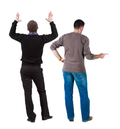 Back view of two man in sweater pointing. Rear view people collection. backside view of person. Isolated over white background.の写真素材