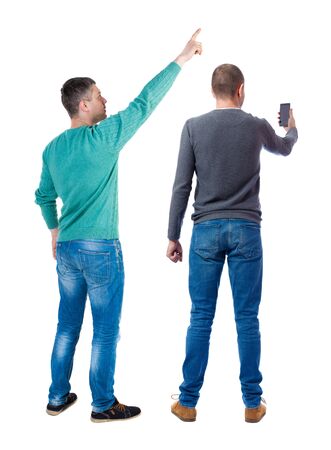 Back view of two man in sweater with mobile phone. Rear view people collection. backside view of person. Isolated over white background.の写真素材