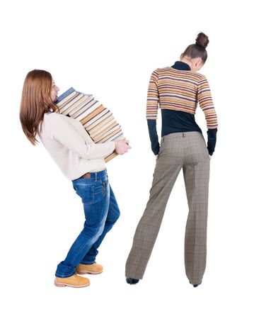 Back view of two woman in sweater. Rear view people collection. backside view of person. Isolated over white background.の写真素材