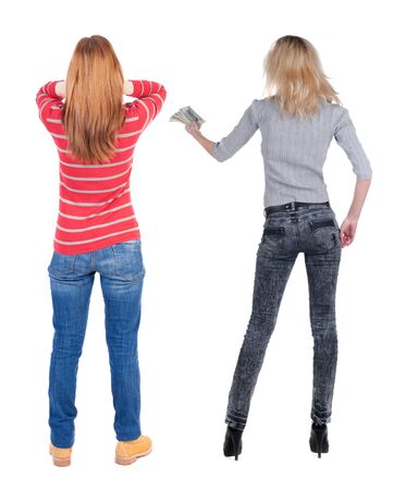 Back view of two woman in sweater. Rear view people collection. backside view of person. Isolated over white background.の写真素材