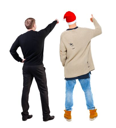 Back view of two man in sweater pointing. Rear view people collection. backside view of person. Isolated over white background.の写真素材