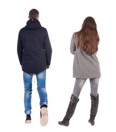 Back view of couple in winter jacket. beautiful friendly girl and guy together. Rear view people collection. backside view of person. Isolated over white background.の写真素材