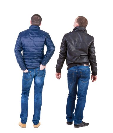 Back view of couple in winter jacket. beautiful friendly girl and guy together. Rear view people collection. backside view of person. Isolated over white background.の写真素材