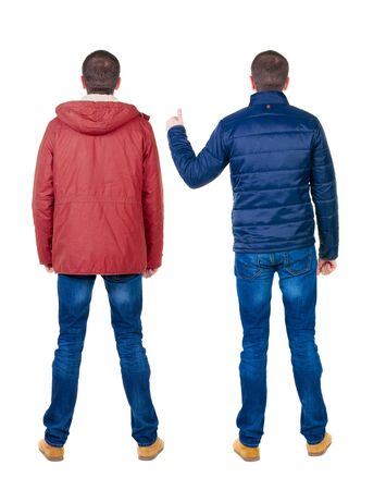 Back view of two man in winter jacket showing thumb up. Rear view people collection. backside view of person. Isolated over white background.の写真素材