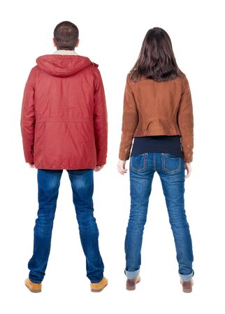 Back view of couple in winter jacket. beautiful friendly girl and guy together. Rear view people collection. backside view of person. Isolated over white background.の写真素材