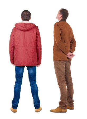 Back view of couple in winter jacket. beautiful friendly girl and guy together. Rear view people collection. backside view of person. Isolated over white background.の写真素材