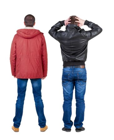 Back view of couple in winter jacket. beautiful friendly girl and guy together. Rear view people collection. backside view of person. Isolated over white background.の写真素材