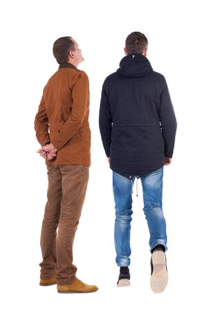 Back view of couple in winter jacket. beautiful friendly girl and guy together. Rear view people collection. backside view of person. Isolated over white background.の写真素材