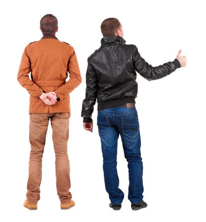 Back view of two man in winter jacket showing thumb up. Rear view people collection. backside view of person. Isolated over white background.の写真素材