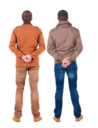 Back view of couple in winter jacket. beautiful friendly girl and guy together. Rear view people collection. backside view of person. Isolated over white background.の写真素材
