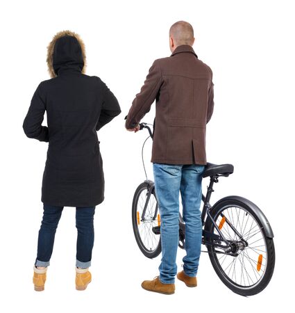 Back view of couple in winter jacket. man on a bicycle and a woman. Rear view people collection. backside view of person. Isolated over white background.の写真素材