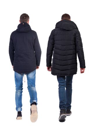 Back view of couple in winter jacket. beautiful friendly girl and guy together. Rear view people collection. backside view of person. Isolated over white background.の写真素材
