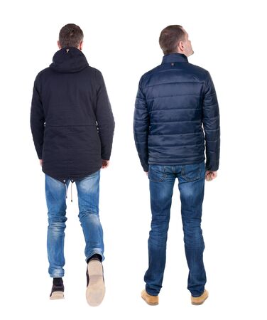 Back view of couple in winter jacket. beautiful friendly girl and guy together. Rear view people collection. backside view of person. Isolated over white background.の写真素材