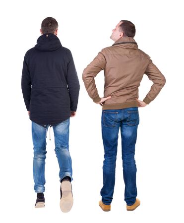 Back view of couple in winter jacket. beautiful friendly girl and guy together. Rear view people collection. backside view of person. Isolated over white background.の写真素材