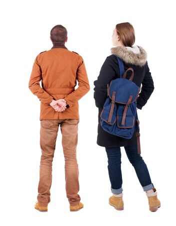 Back view of couple in winter jacket. beautiful friendly girl and guy together. Rear view people collection. backside view of person. Isolated over white background.の写真素材