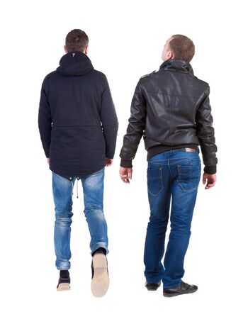 Back view of couple in winter jacket. beautiful friendly girl and guy together. Rear view people collection. backside view of person. Isolated over white background.の写真素材