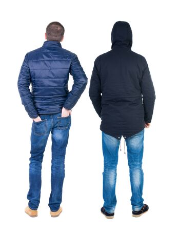 Back view of couple in winter jacket. beautiful friendly girl and guy together. Rear view people collection. backside view of person. Isolated over white background.の写真素材