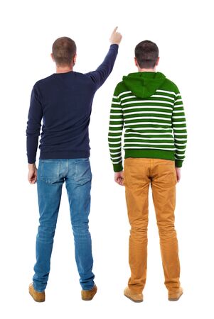 Back view of two man in sweater pointing. Rear view people collection. backside view of person. Isolated over white background.の写真素材