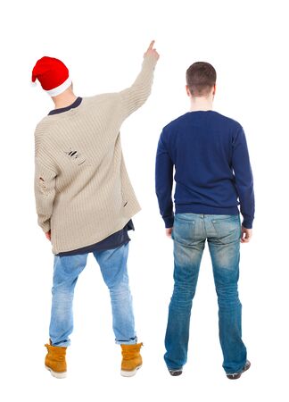 Back view of two man in sweater pointing. Rear view people collection. backside view of person. Isolated over white background.の写真素材