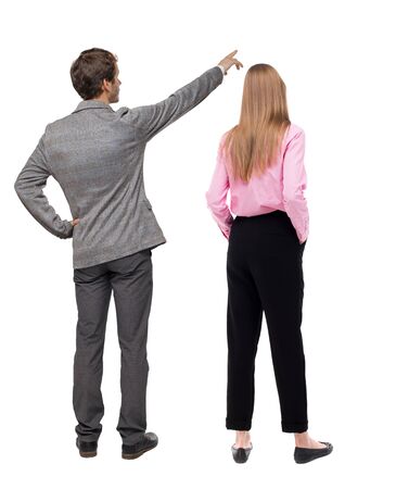 Back view of business man and business woman in suit pointing. Business team. Rear view people collection. backside view of person. Isolated over white background.の写真素材