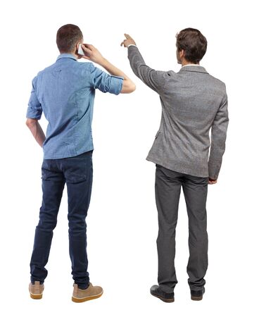 Back view of two business man in suit with mobile phone. Business team. view people collection. backside view of person. Isolated over white background.の写真素材