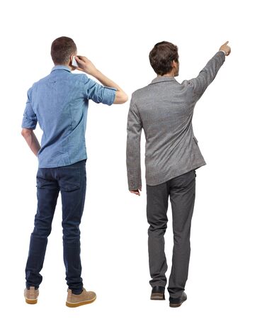 Back view of two business man in suit with mobile phone. Business team. view people collection. backside view of person. Isolated over white background.の写真素材