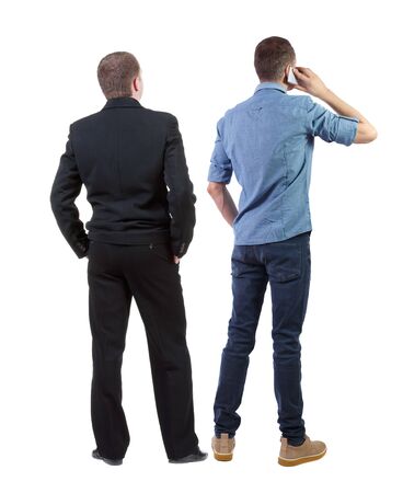 Back view of  two business man in suit with mobile phone. Business team. view people collection. backside view of person. Isolated over white background.の写真素材