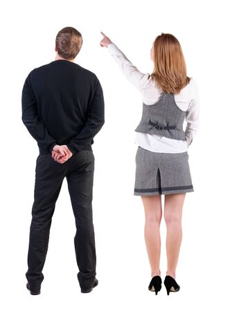 Back view of business man and business woman in suit pointing. Business team. Rear view people collection. backside view of person. Isolated over white background.の写真素材