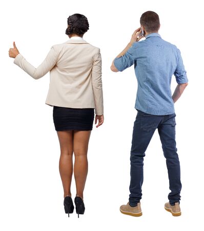 Back view of business woman and business man in suit with mobile phone. Business team. Rear view people collection. backside view of person. Isolated over white background.の写真素材